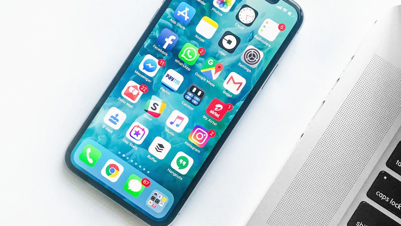 Business owner checking a poor mobile website layout on a phone