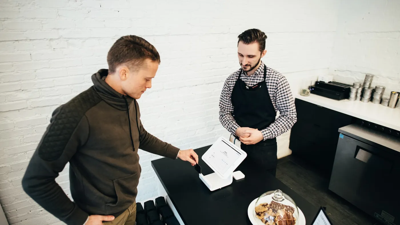 Customer receiving a service reminder text message on a phone