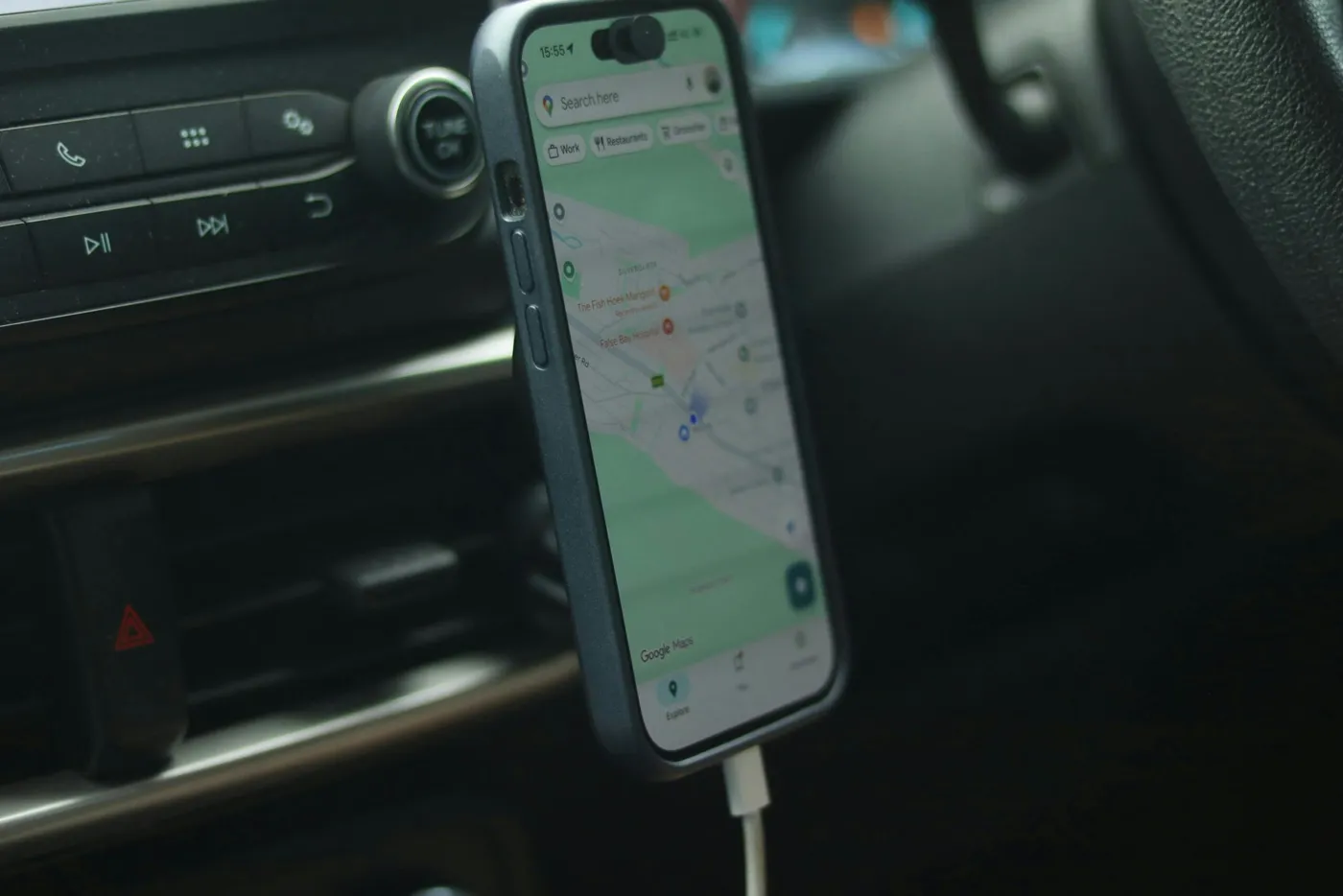 Navigation app on a phone showing nearby search and map visibility