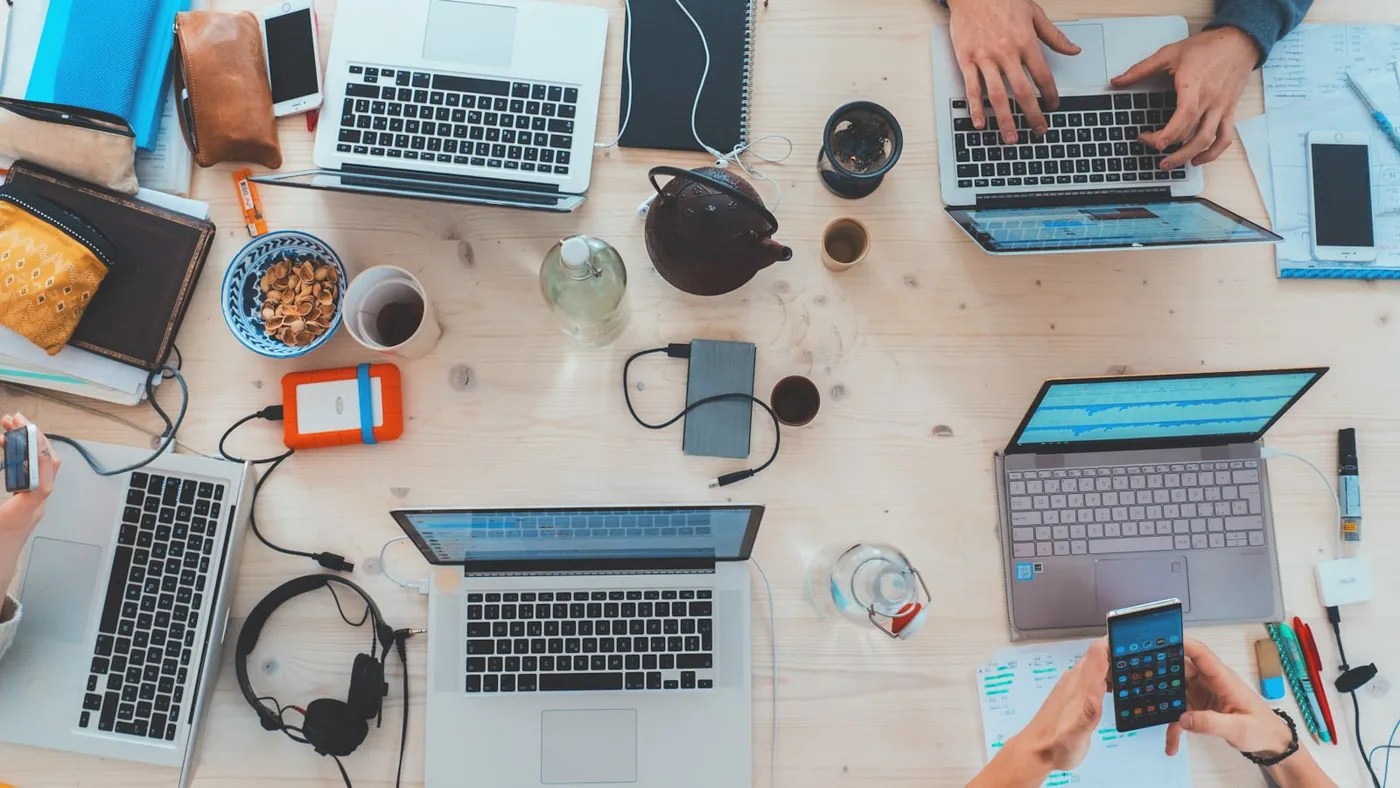Wide monitor setup used to check website SEO data and search performance